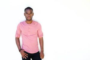 55542860-portrait-of-serious-young-african-man-standing-